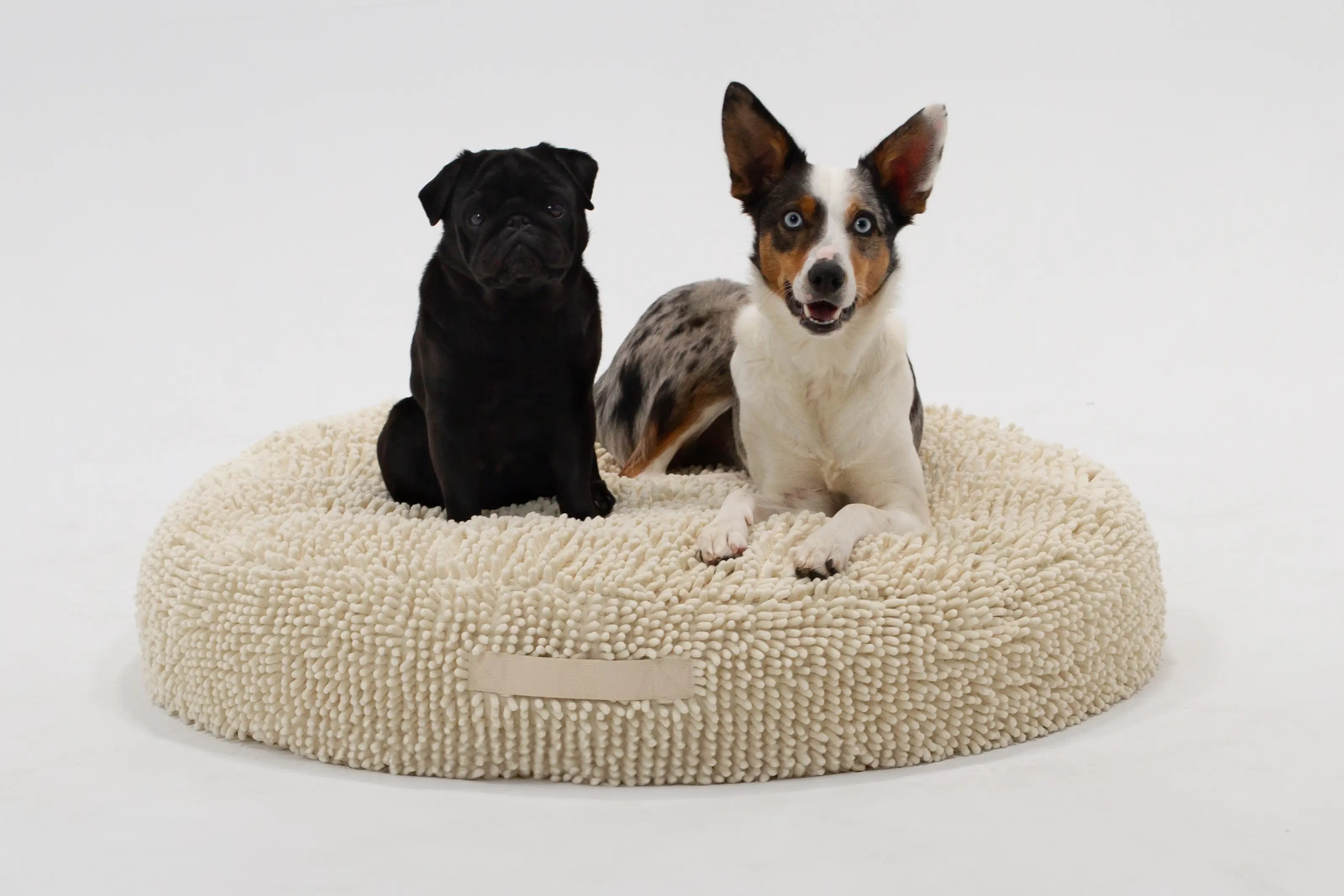 Medium Snoozy Bed - Calming Orthopedic Donut Dog Bed (Cream Towel)