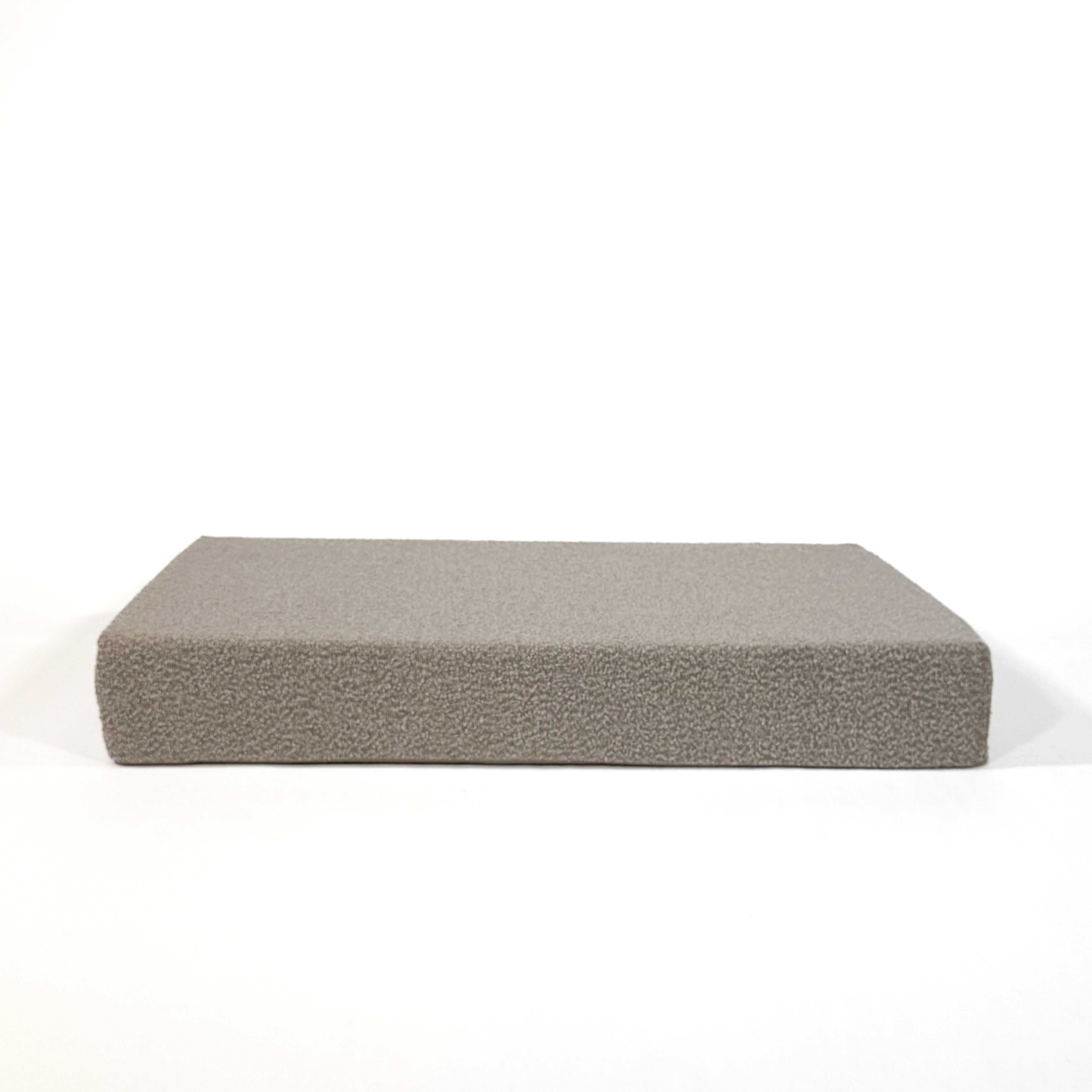 Rectangular cushion dog bed on a white background