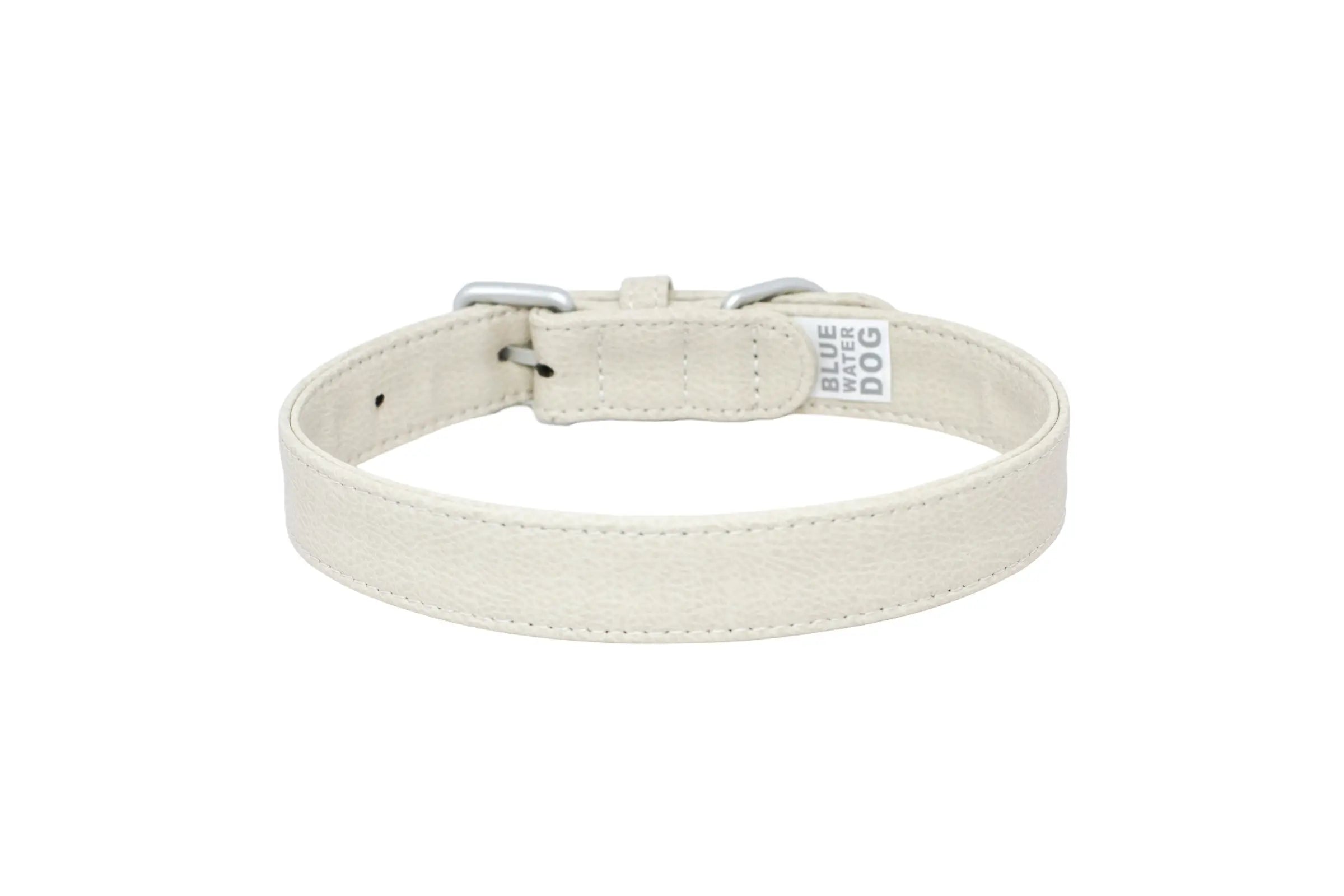 Back of a waterproof and durable dog collar with vegan leather and marine grade anodized aluminum hardware in the color oyster.