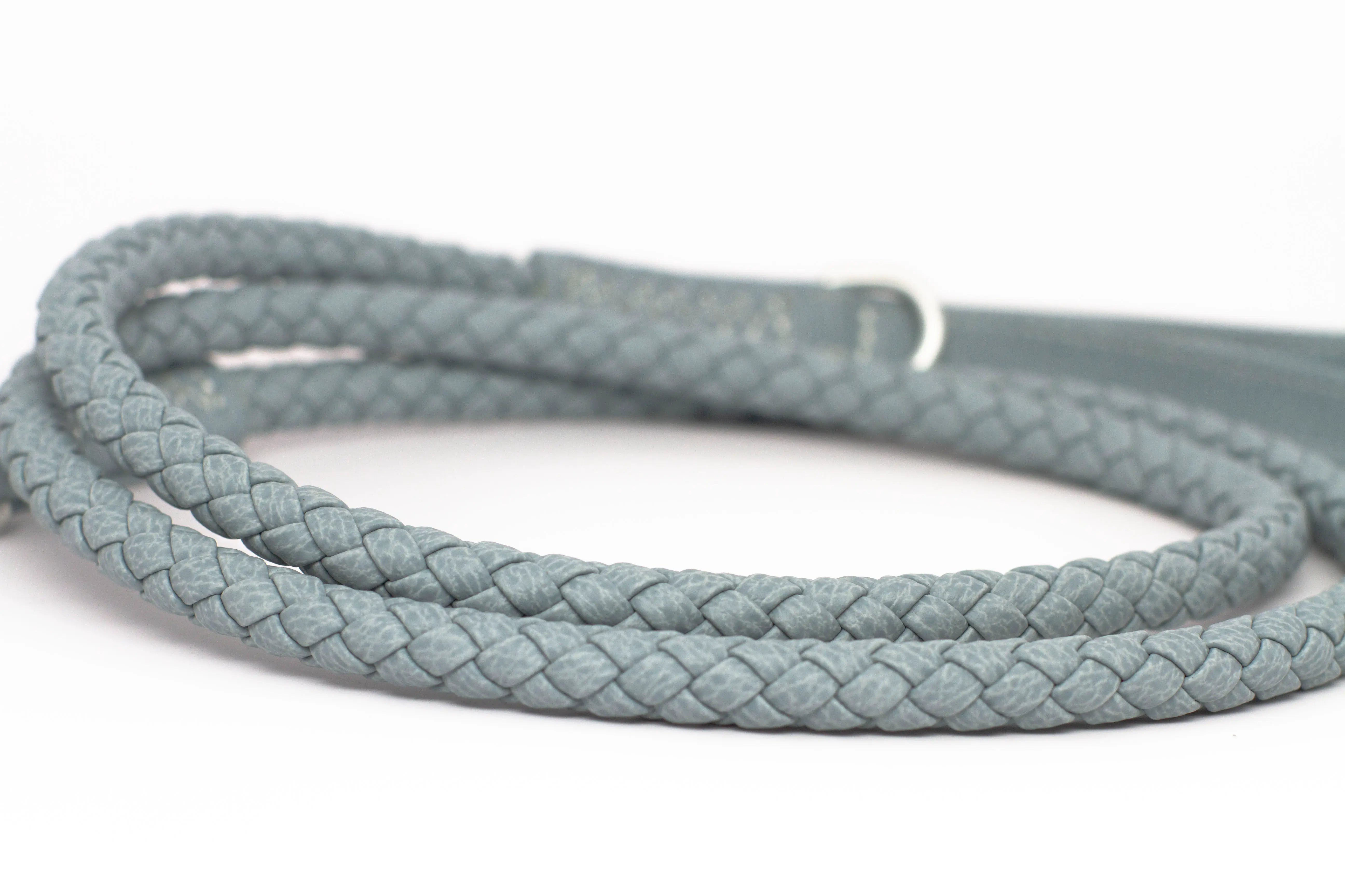 Close up of the braid of waterproof and durable dog leash with marine grade anodized aluminum hardware in the color London blue.