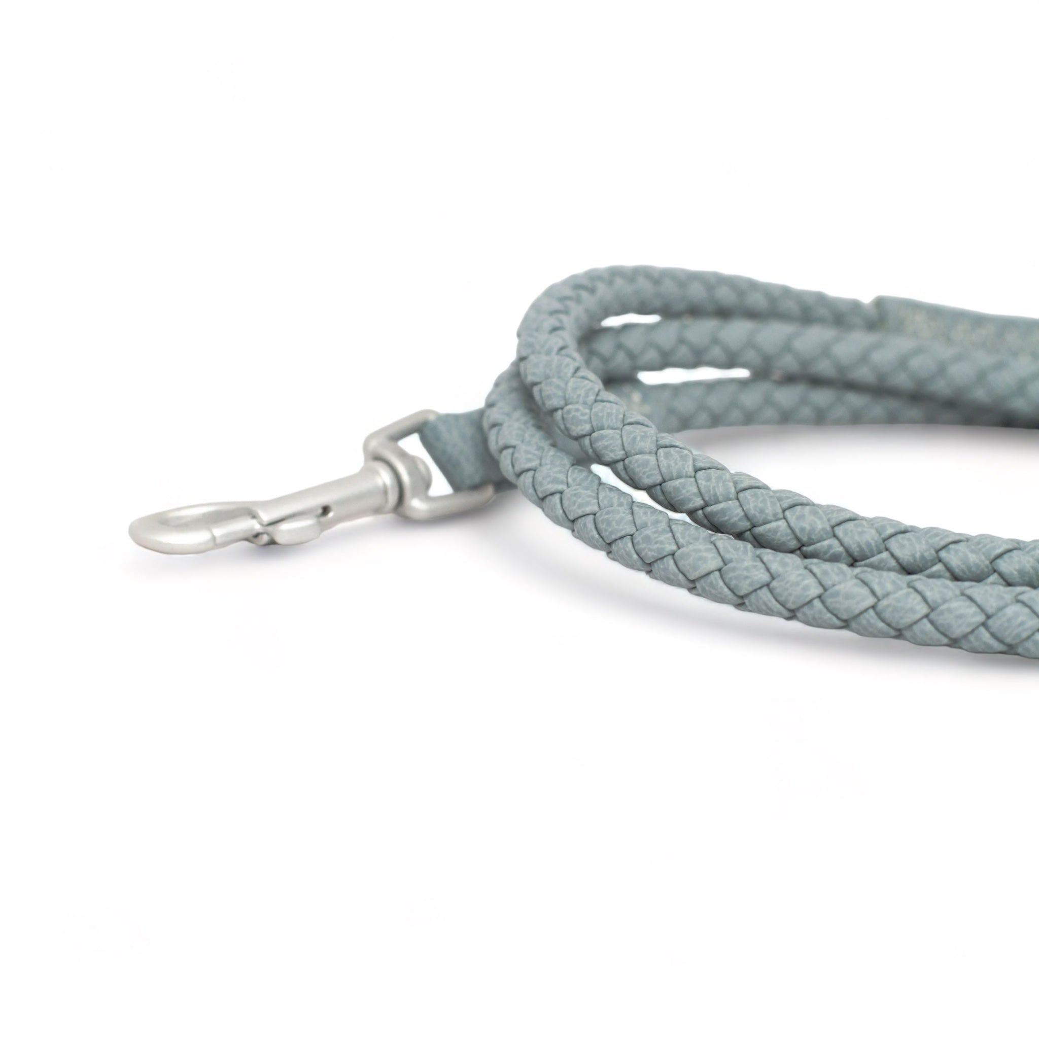 Close up of a waterproof and durable dog leash with marine grade anodized aluminum hardware in the color London blue.