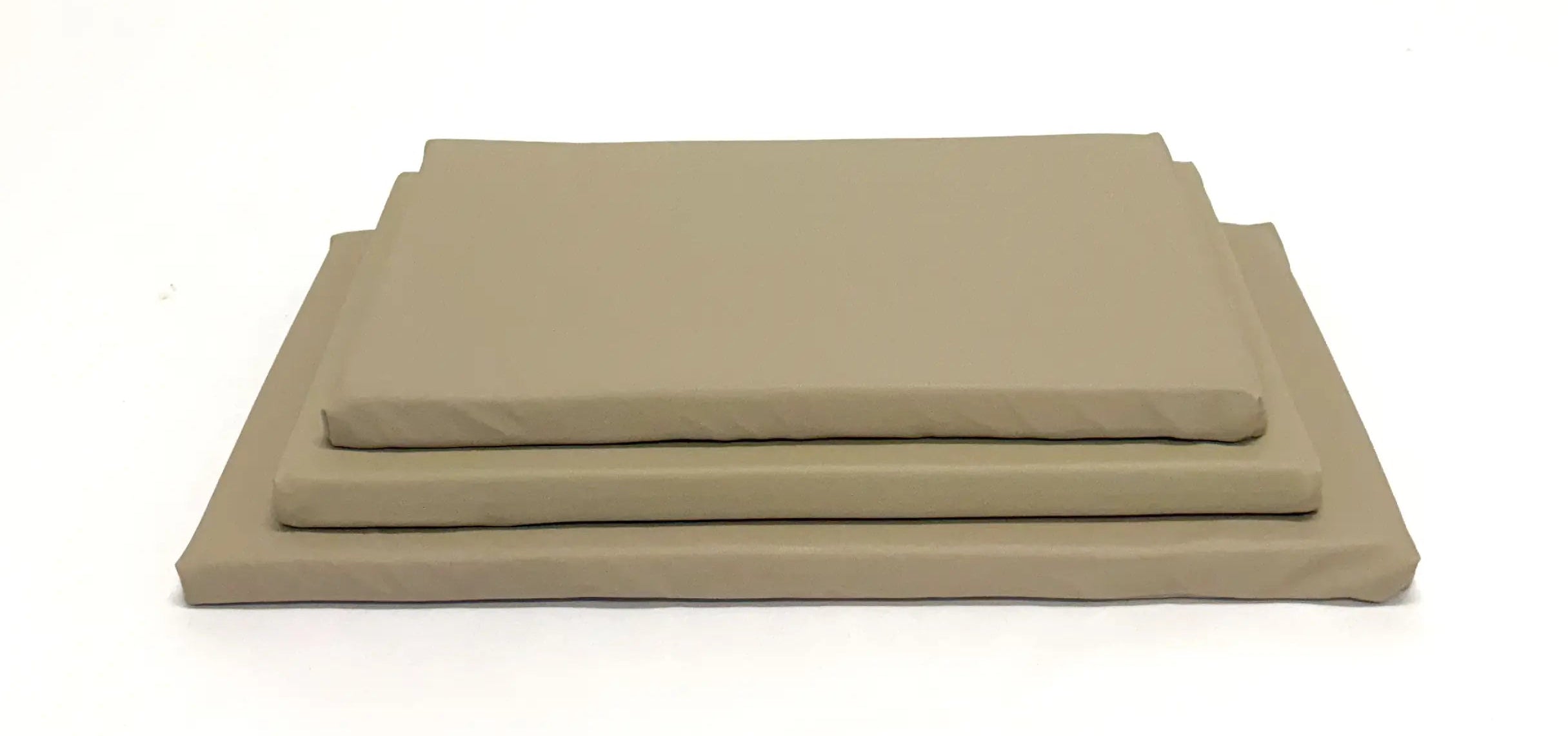 Three different crate pad sizes stacked on top of each other on a white background.