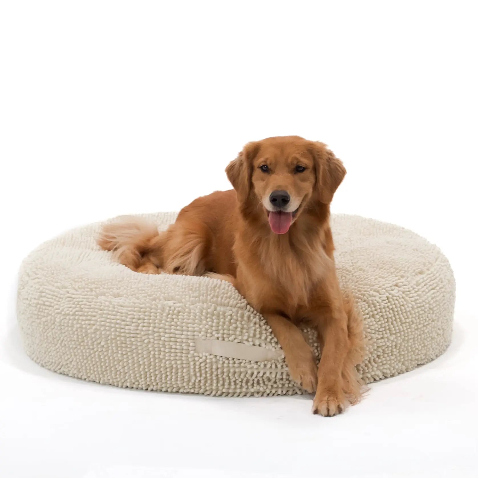 Golden Retriever laying on a large Bluewater Dog orthopedic round snoozy dog bed.
