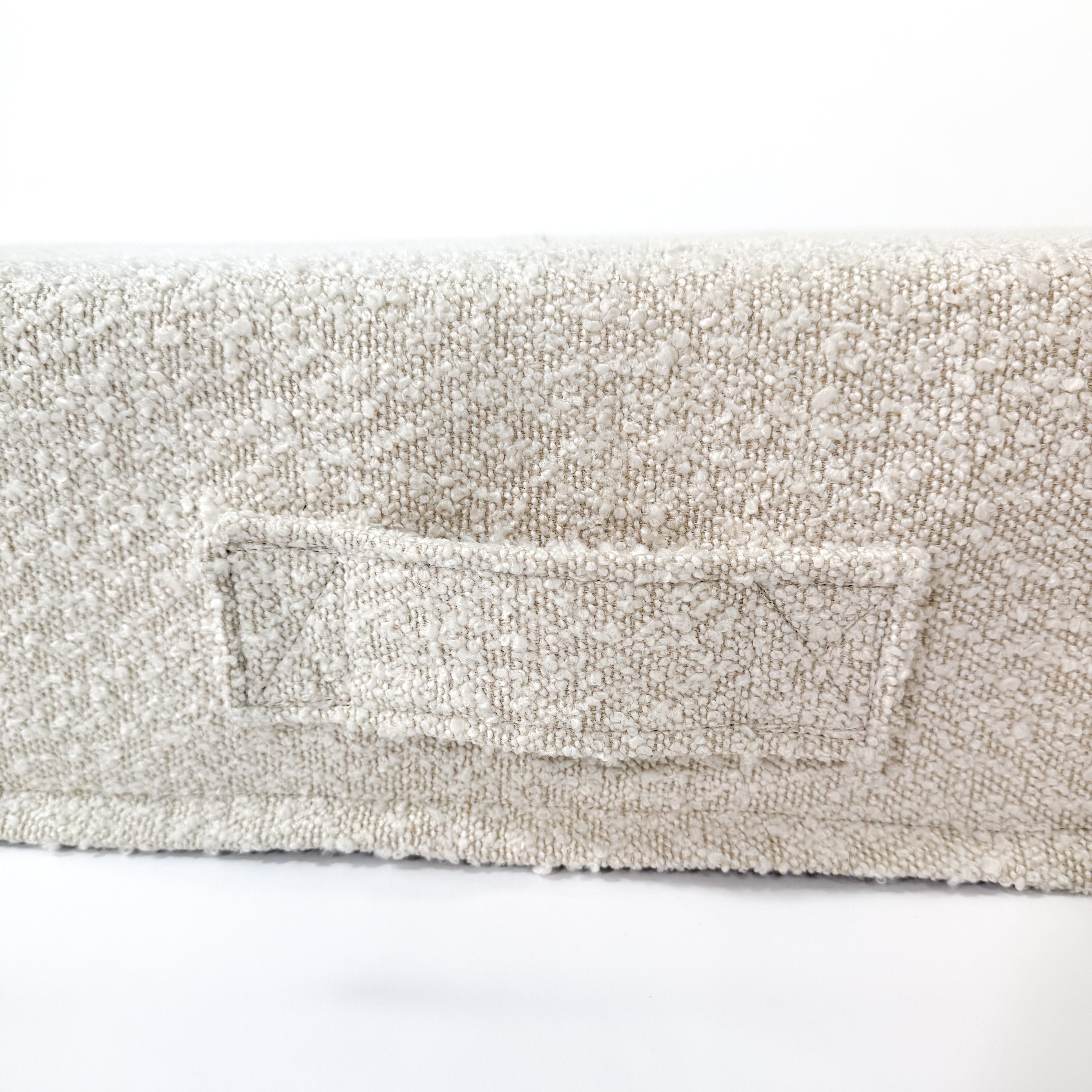 Handle on a dog bed.