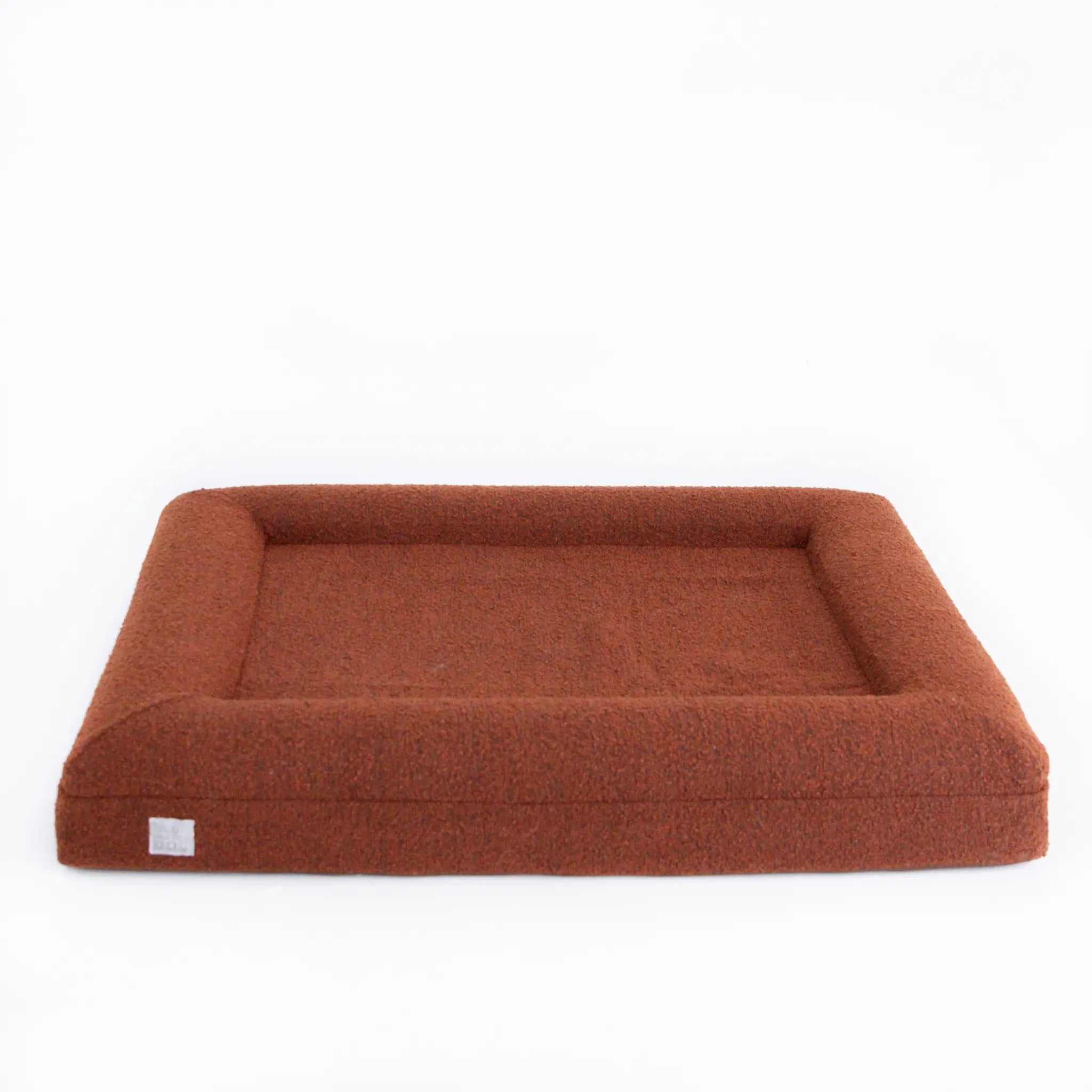 Orthopedic dog bed in the color pumpkin spice.