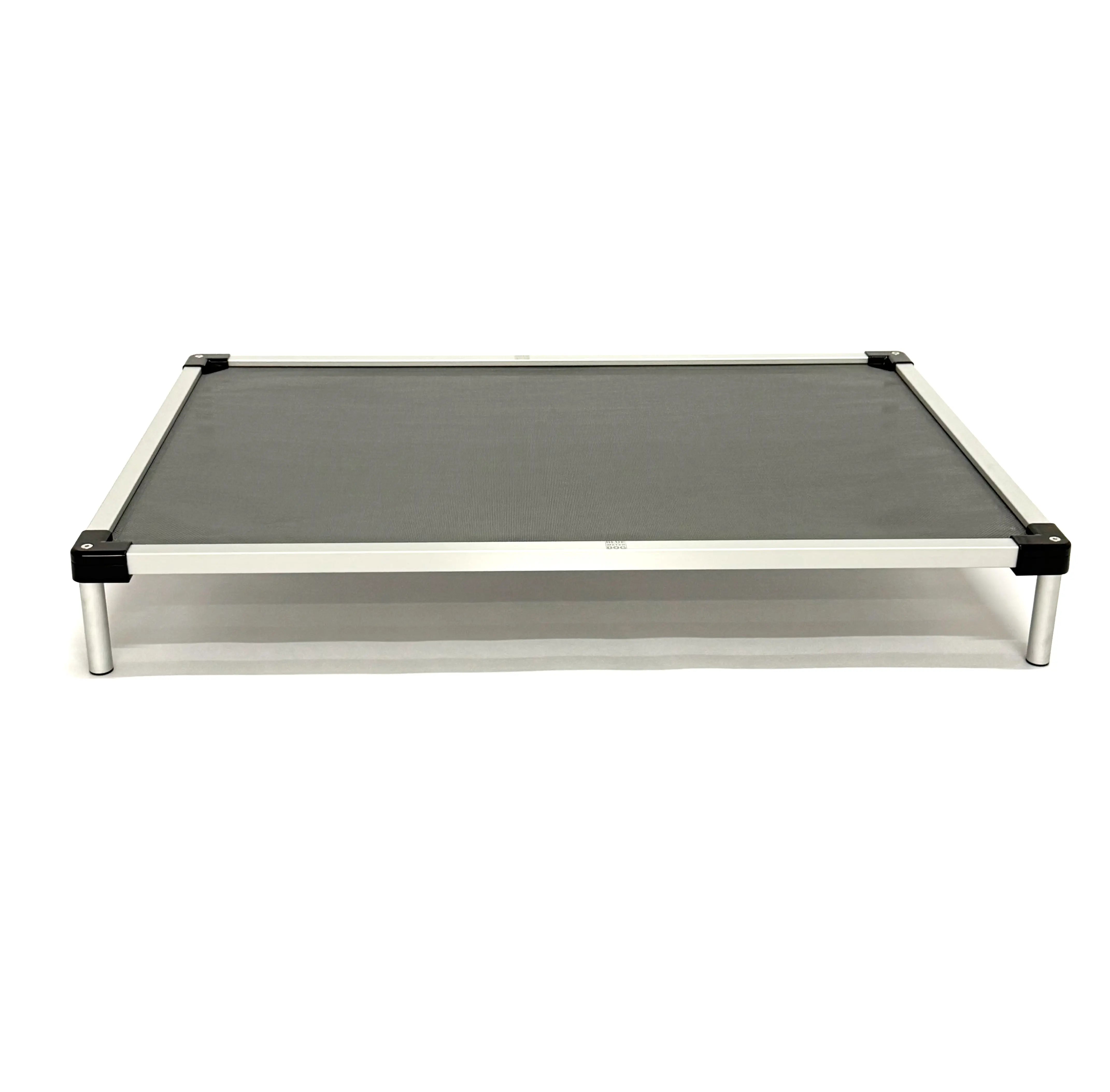 Raised aluminum dog bed on a white background.